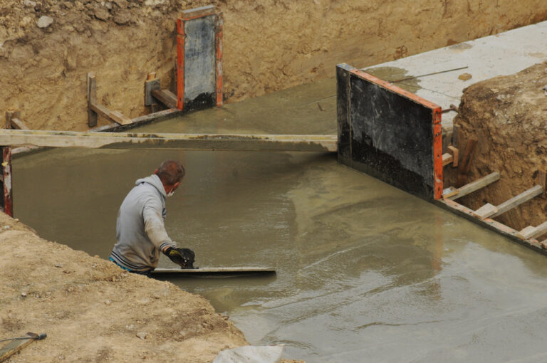 Ongoing concrete foundation installation for a commercial building