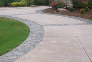 Beautifully installed stamped driveway in a garden