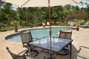 Pool deck with stamped concrete in residential area